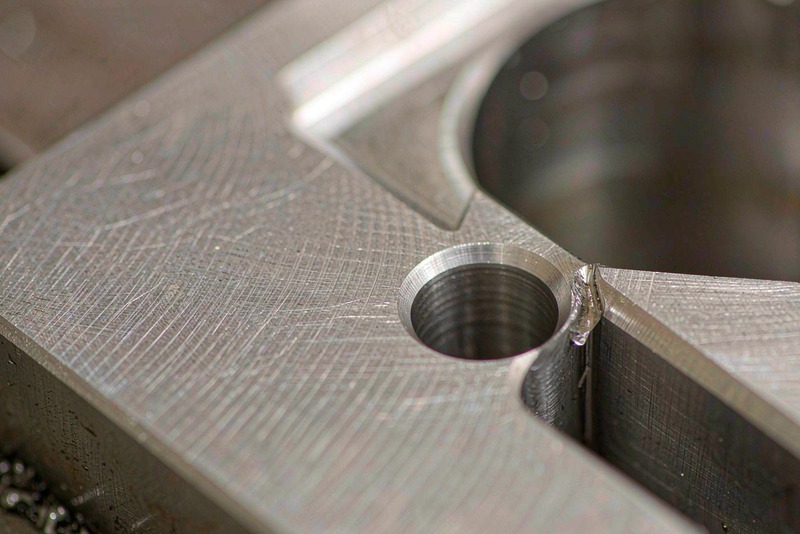 Deburring CNC Machined Parts: Methods, Edge Specs, and Cost Impact