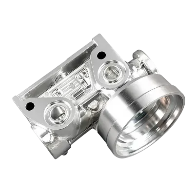Machined aluminum housing with circular bores and mounting features