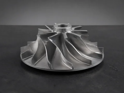 Representative metal impeller with curved blades