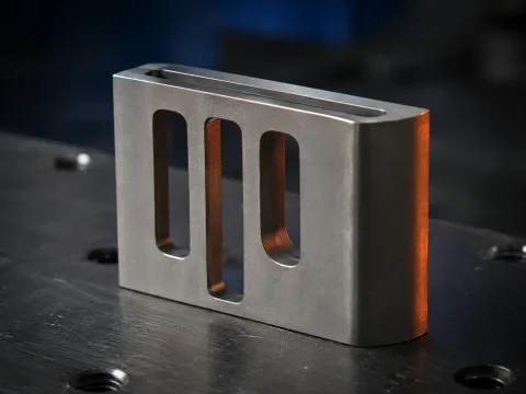 Representative metal component with narrow Wire EDM slots