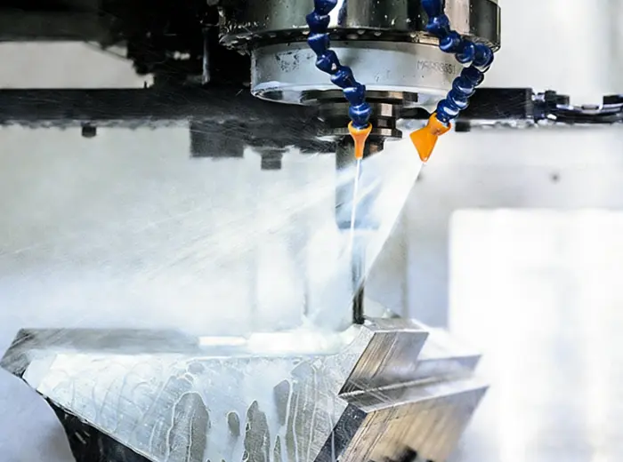 Representative CNC milling process before secondary feature completion