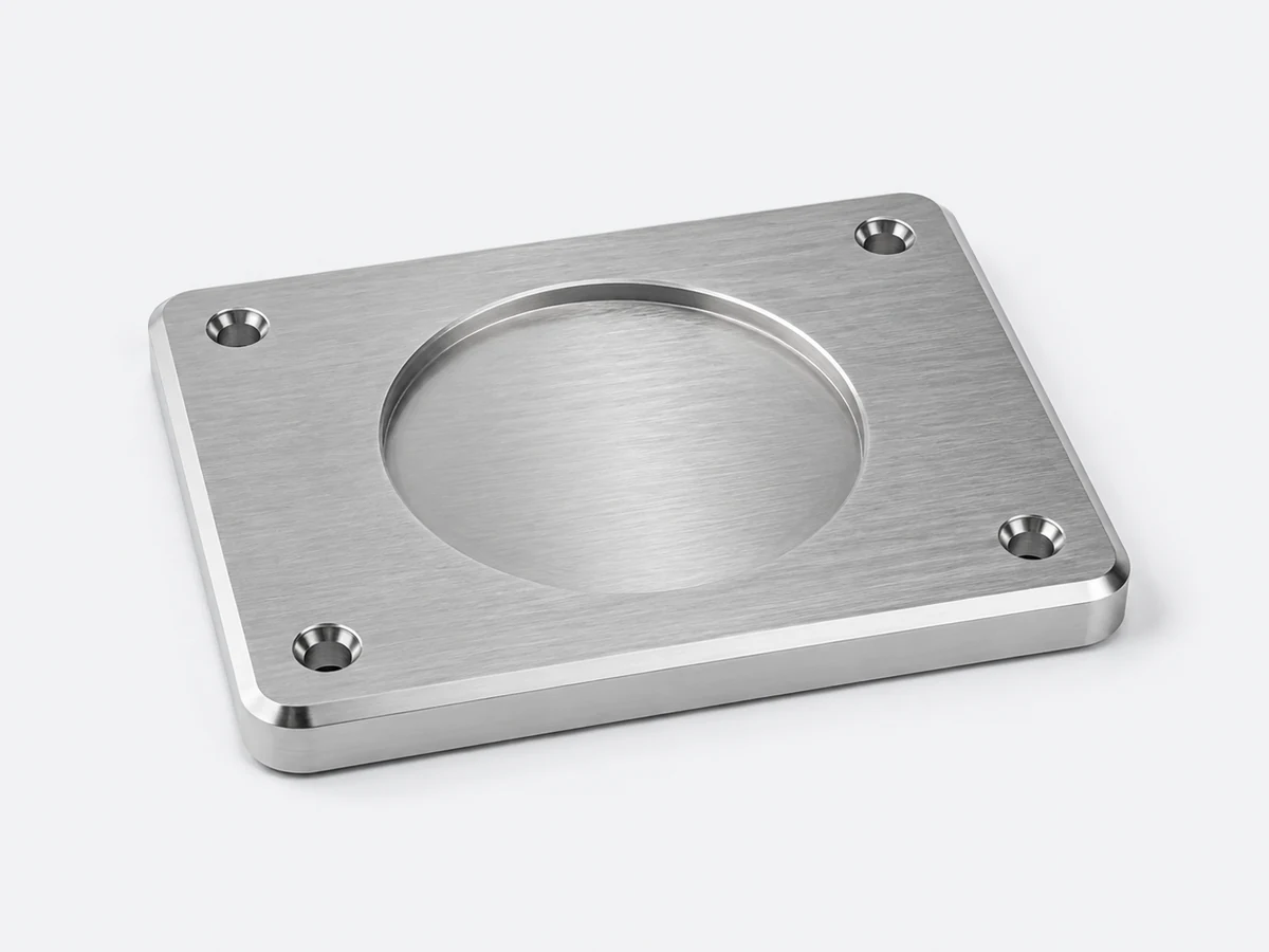 Illustrative instrument cover with a directional brushed metal face
