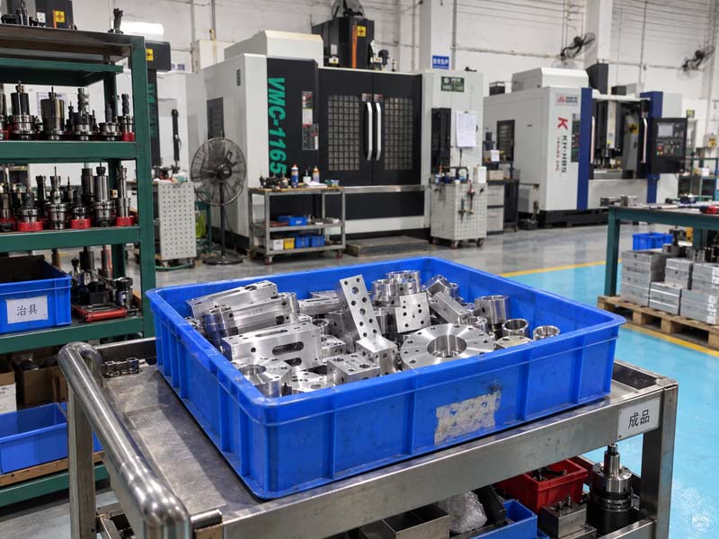 Machined aluminum thin-wall parts in workshop bin